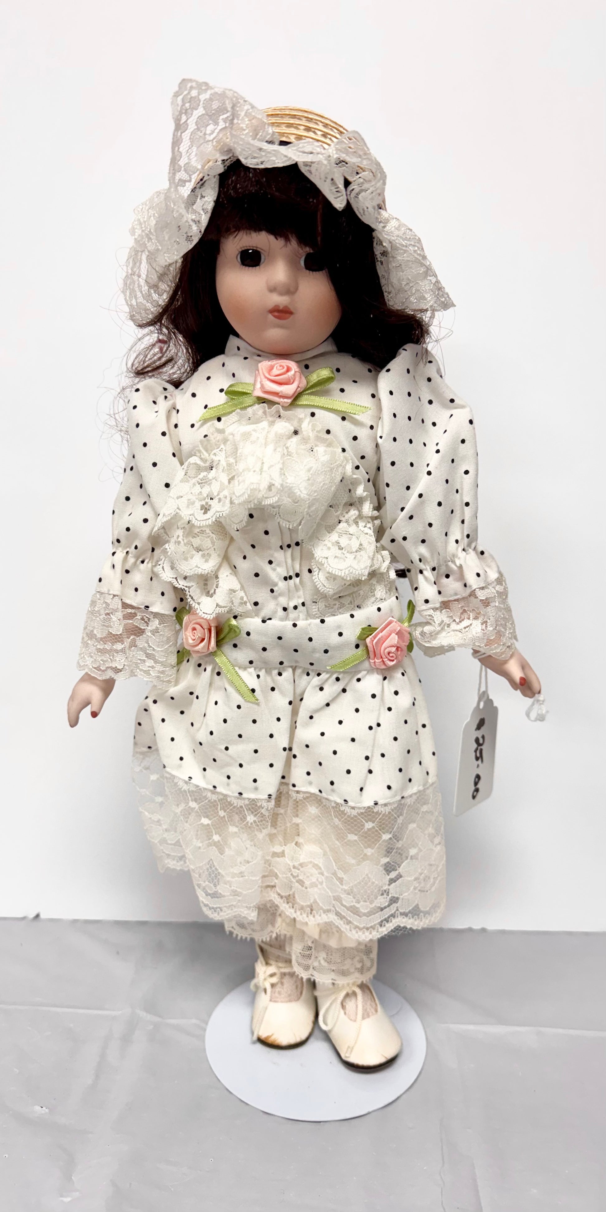 Vintage Porcelain Collectible Doll – Dark Hair, Floral & Cream Dress